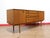 This gorgeous sideboard was designed and manufactured by Nathan Furniture in the mid 1960s, showcasing authentic Danish...