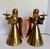 Here is a pair of vintage mid-century brass and copper angel candleholders, made in Hong Kong. Each sculptural figure is...