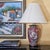 This vintage Chinese Chinoiserie‑style porcelain table lamp features a richly detailed hand‑painted floral design in...