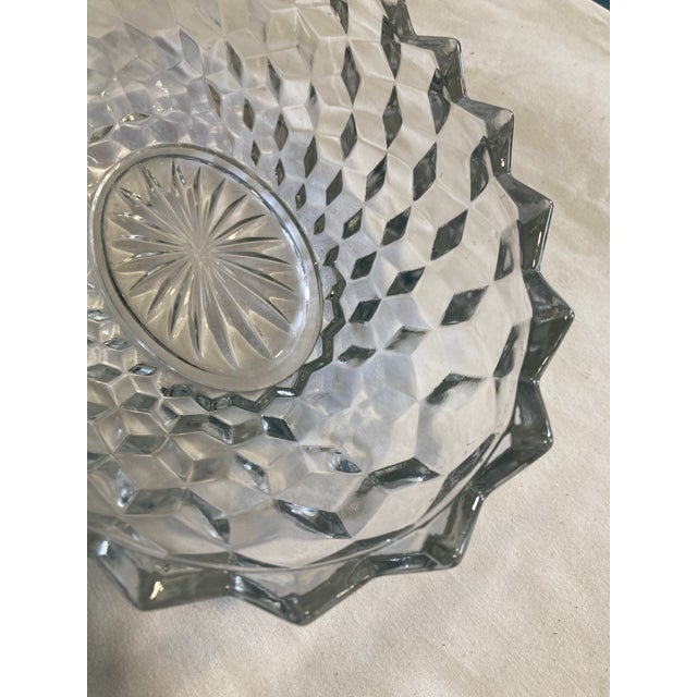 Truly lovely with cubist edge and traditional Fostoria starburst in the middle. Excellent condition .