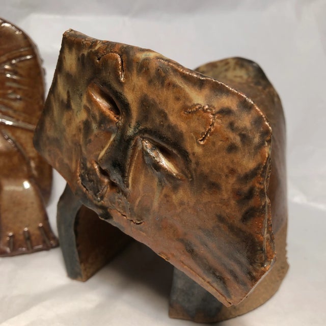 2 ceramic cat sculptures 1 with mat glaze 1with glossy enamel glaze both signed 1 is 7 long 4.5 high & 3 deep other 4.5...