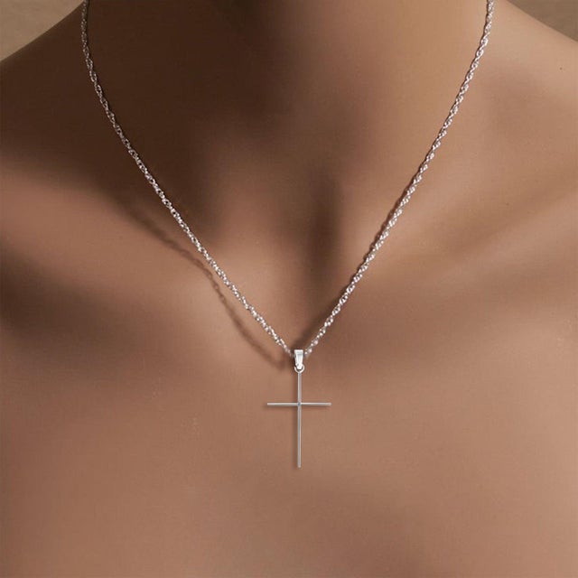 ♥ Product Summary ♥ Details: Skinny Gold Cross Weight: 1 gram Material: 14k Yellow Gold Dimensions of Pendant: 28mm x 17mm