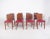 Set of eight Deco-style dining chairs. Sober lines and a sturdy wooden frame, they have a functional, modern-inspired...