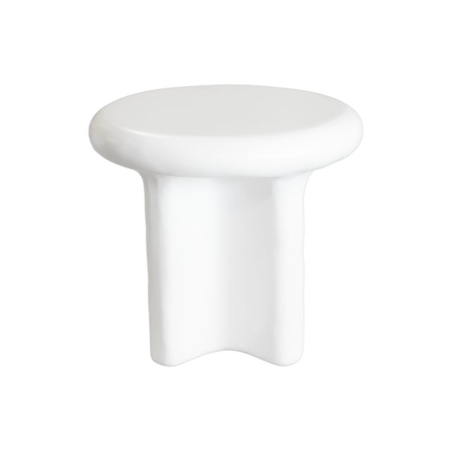 This pair of Bodene side tables by Vuue presents a sculptural take on everyday function. Crafted in cast resin with a...