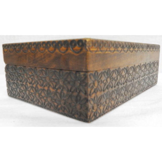 Hand-carved floral details surround this striking wooden box from Italy. The top has an oval area carved out with a...