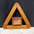 Charming antique triangular cribbage board crafted with warm-toned wood and finely inlaid decorative banding. The board...
