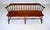 20th-century Philadelphia Windsor-style low-back bench settee, modeled after 1750s colonial originals. Features include...