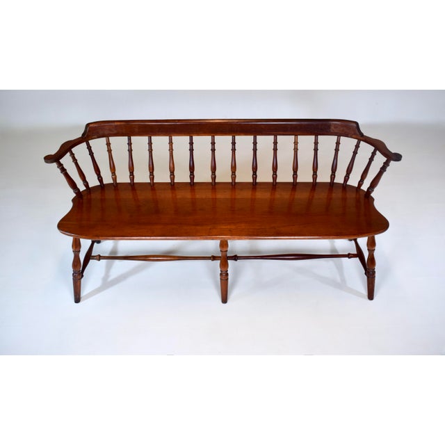 20th-century Philadelphia Windsor-style low-back bench settee, modeled after 1750s colonial originals. Features include...