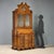 Walnut and burl walnut trumeau, crafted in Italy in the early 20th century, exudes timeless elegance with its refined...