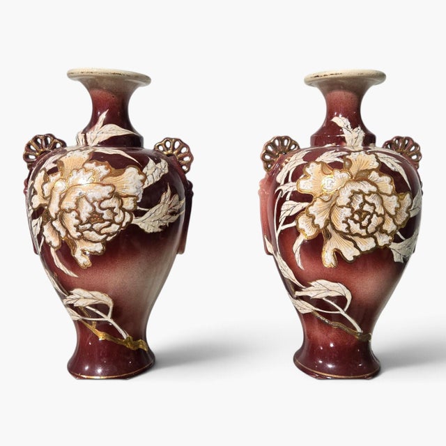 We are pleased to offer a stunning pair of antique Japanese Satsuma Moriage ceramic vases from the late 19th to early 20th...