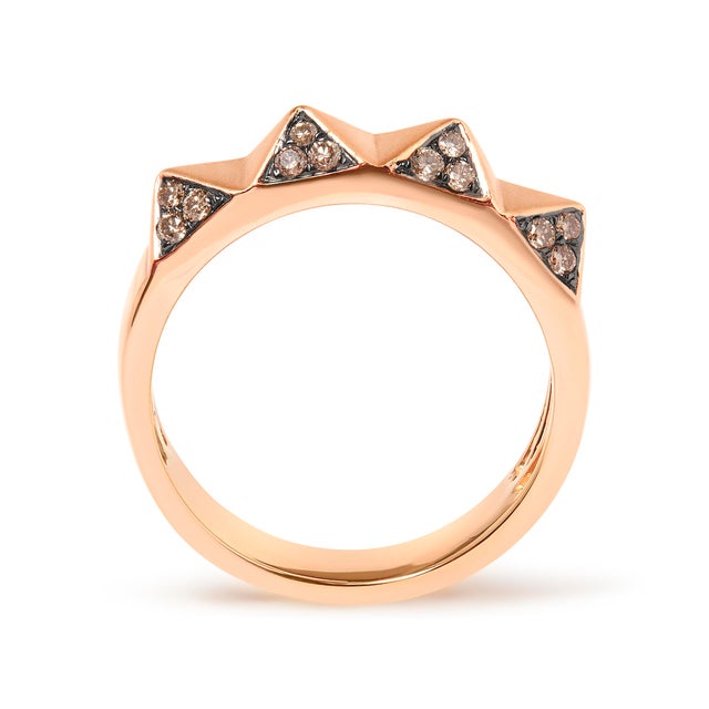 Immerse yourself in the elegance of this exquisite ring, masterfully crafted from lustrantine 14K rose gold. Its unique...