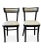 A pair of restored Thonet bentwood bistro chairs, made in New York. The vintage dining chairs have been restored with new...