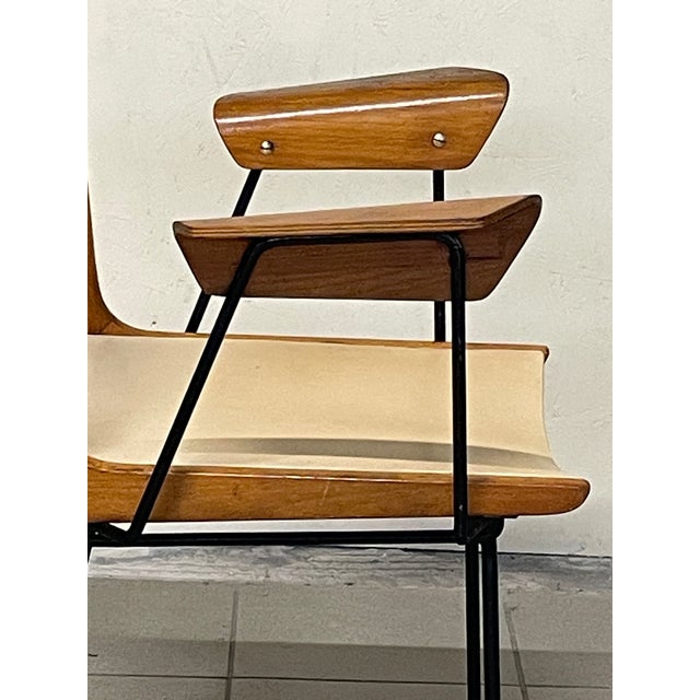 A 1950s Boomerang desk chair by Carlo Ratti, made in Italy and of high quality. The name "Boomerang" derives from its...