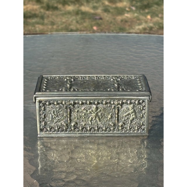 An ornate antique Renaissance Revival hinged box by the prestigious German company Erhard & Söhne. The box dates to the...