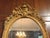 Circa 1860-80 oval carved, giltwood Mirror, French. Grand proportions. Bevelled mirror plate. The splendid Baroque-Rococo...