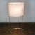 A Big table lamp from the 70s. Italian production. Paolo Rizzato for Arteluce. Minimalist Design. Golden version. Complete...
