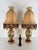 Set of two large Satsuma-style oriental table lamps, 1950s. Depicts scenes inspired by Satsuma-style geishas. Shaped...