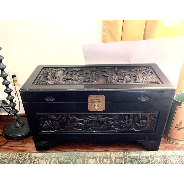 A Vintage, carved, camphor wood storage chest from Majestic Co., a well known furniture company in Kowloon, China that has...
