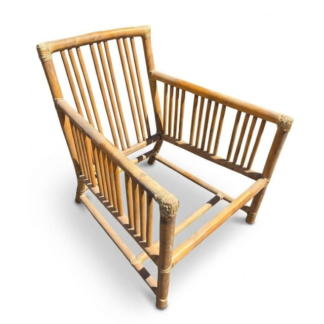 The Italian Mid-Century Modern Indian Cane and Bamboo Lounge Chair represents a highly sought-after fusion of European...