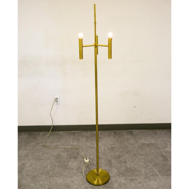 Matching 3 light floor lamps recently imported from Denmark. Tested and in working condition. Each lamp as a floor button...
