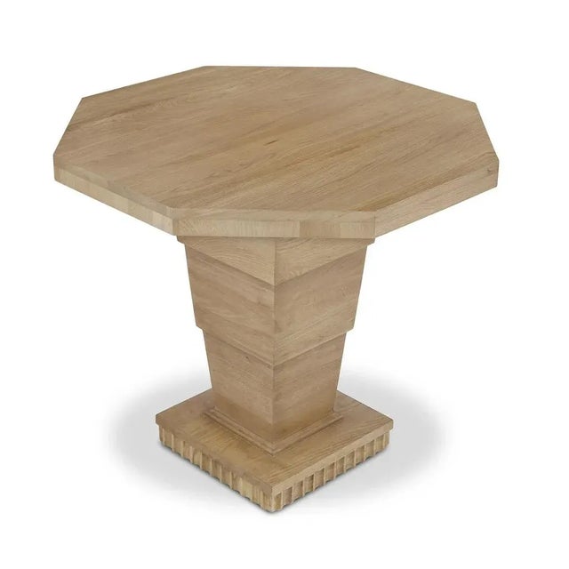 A reassuringly solid side table, generously scaled for helping to anchor sofas and chairs alike, made of warm oak,...