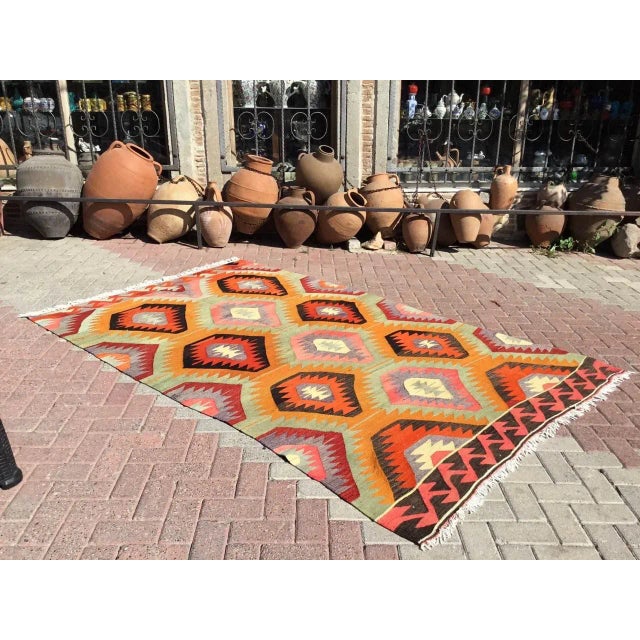 This beautiful, vintage, handwoven kilim is approximately 50 years old. It is handmade, of very fine quality hand spun...