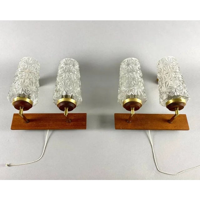 Vintage set of two double arm wall lamps. german vintage lighting set! particularly beautiful double wall lamps in...