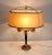 Large lamp of Empire style in gilded brass, provided with 3 arms of lights and topped with a consequent lampshade....