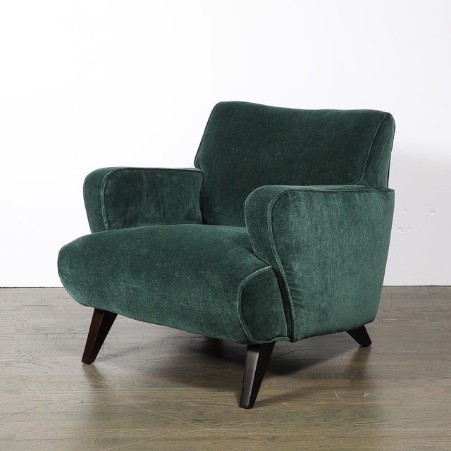 This exquisite pair of Mid-Century Modernist lounge chairs, crafted in the United States circa 1950, embodies the sleek...