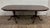 This is a stunning vintage Drexel Georgian style cherry double pedestal dining table with two leaves and table pad covers,...
