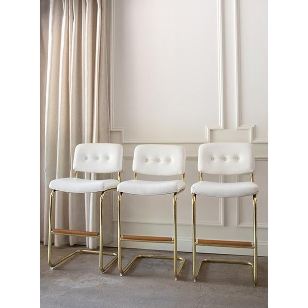 Bring classic mid-century modern style to your kitchen or bar with this striking trio of 1990s cantilever barstools. Heavy...