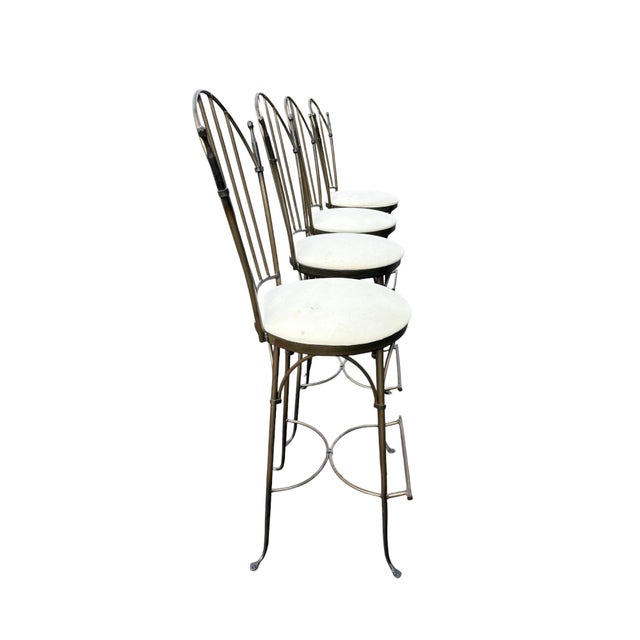 Quick Hits Crafted by Charleston Forge, made in the USA Classic black wrought iron with graceful lines Swivel seats with...