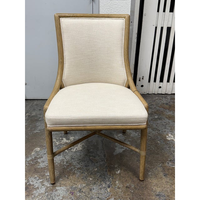 Design Plus Gallery presents the Passage Cane Back Side Chair by Laura Kilar from McGuire Furniture. The chair showcases a...