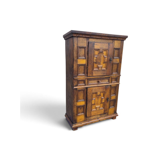 Specifications This 18th-century geometric Baroque cabinet is a striking example of period craftsmanship, defined by its...
