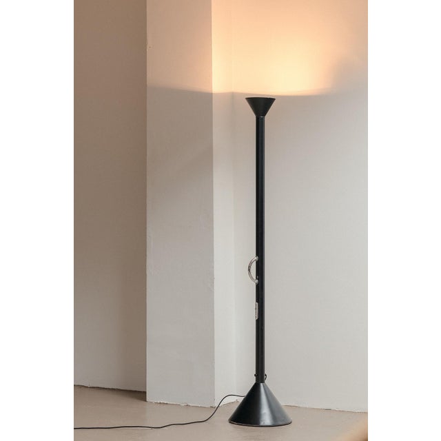 Limited edition floor lamp designed by Ettore Sottsass and produced by Artemide in Italy around 1980. In good condition...