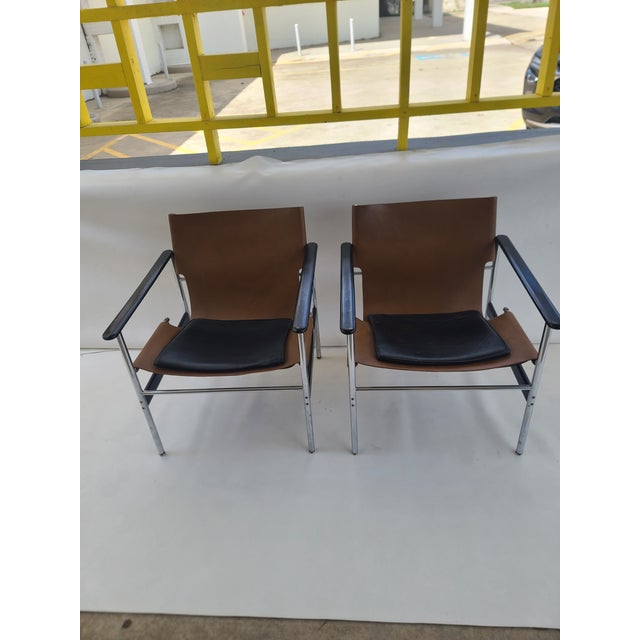 Pair of original marked Chrome and Leather Side Chairs by Charles Pollock for Knoll. Retain early Knoll label on bottom....