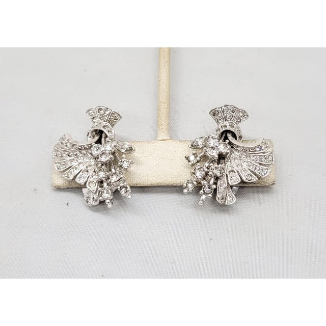 Pennino Vintage 1950s Signed Pennino Rhodium Plated Clear Rhinestone Floral Spray Clip Earrings - 2 Pieces For Sale - Image 4 of 8