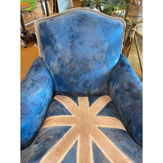 A striking and completely unique Union Jack armchair, custom finished in the iconic red, white and blue of the British...