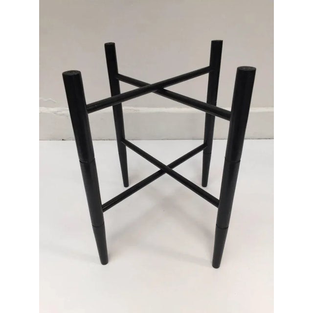 Vintage folding black wooden tray table stand. Size is 17.5" diameter x 18 height will hold a metal tray from 19 inches to...