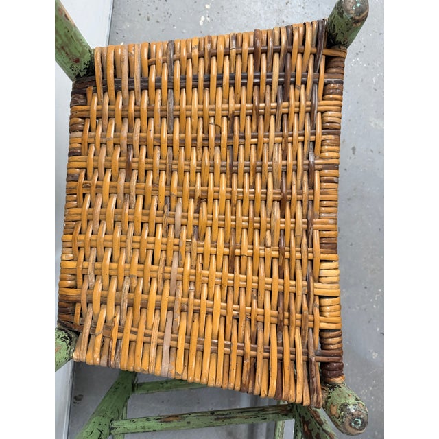 Pair of beautifully distressed early American ladder back chairs with stunning woven seats in wonderful condition. The old...