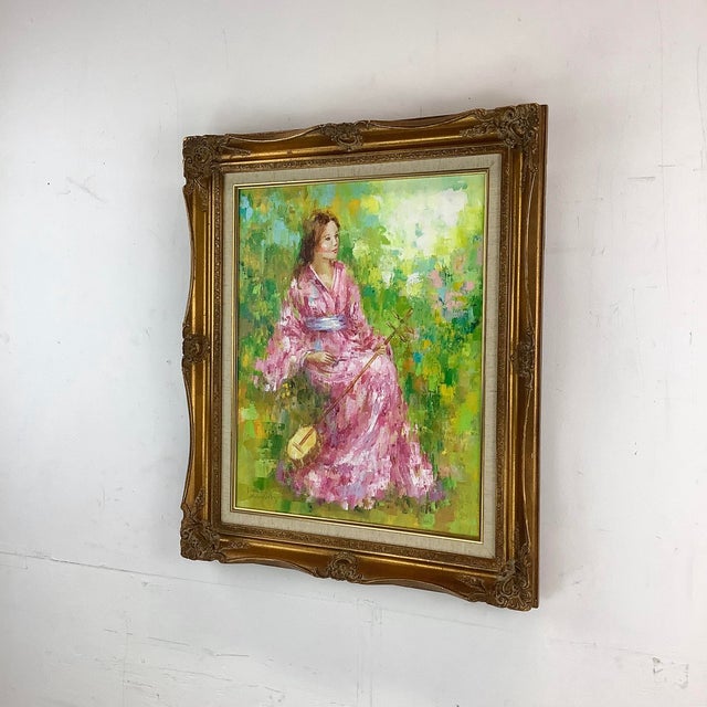 This signed vintage oil painting by European artist Karin Schaefers presents a serene and culturally rich scene of a...