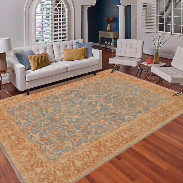 "Enhance the ambiance of your home with this magnificent Persian-influenced Turkish hand-knotted rug made by skilled...