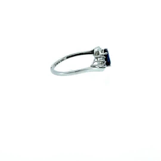 Early 21st Century 10k White Gold Oval Blue Cz Bypass Ring With Cz Accents, Size 6.5 For Sale - Image 5 of 5