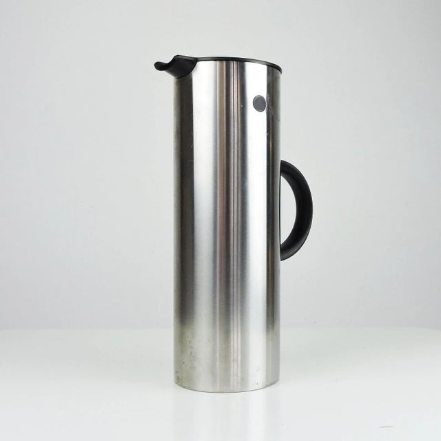 A 1960s stainless steel coffee pot by Stelton. This piece is attributed to the mentioned designer/maker. It has no...