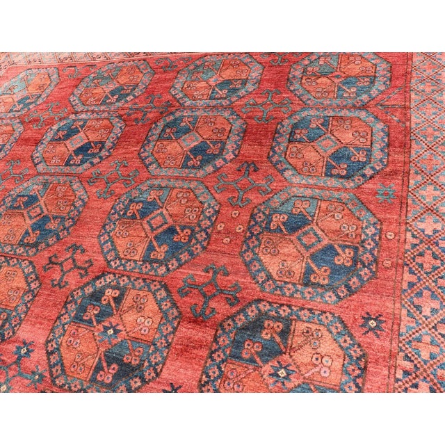 Early 20th Century Hand-Knotted Turkomen Ersari Rug in Wool With Gul Design in Red, Orange and Blue For Sale - Image 12 of 13