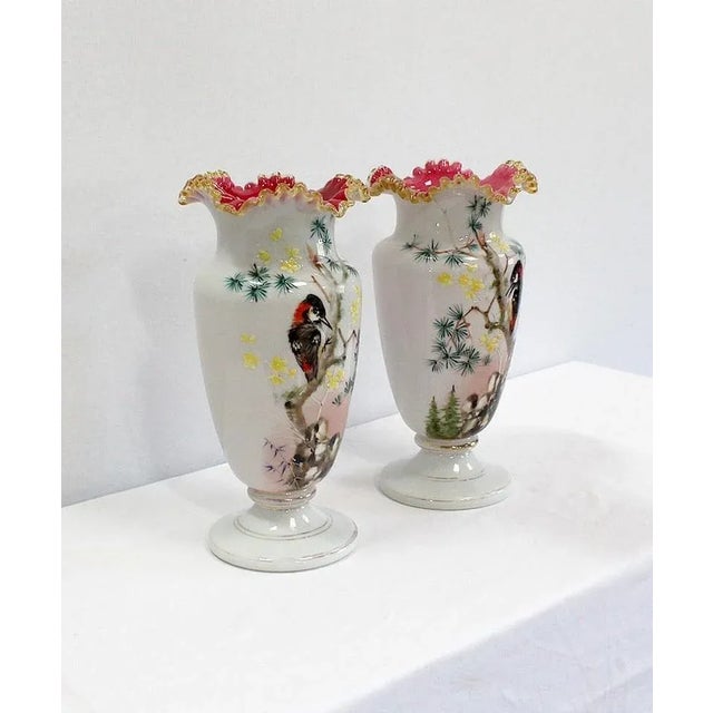 Pair of Glass Glass Glass Bases with White Background and Polychrome Decor and Gold. Each of these vases has a corrugated...