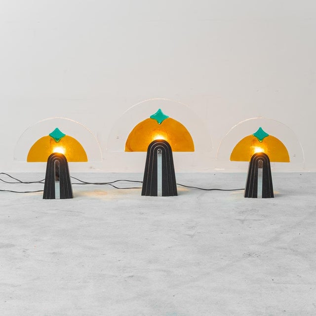 Set of 3 gambarro & poggi lamps. metal base and colored murano glass shade. good condition. they may show signs of wear....