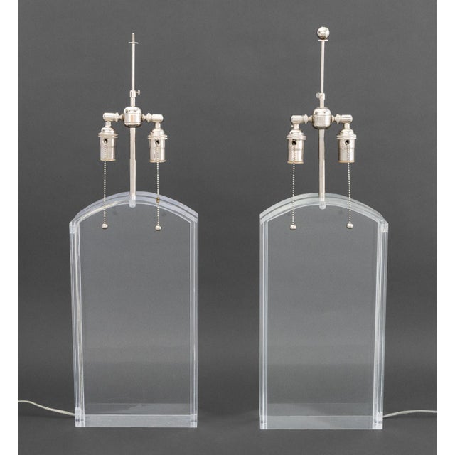 Pair of Modern Clear Acrylic and Chrome Table Lamps. 30" H x 9.5" W x 4" D. Provenance: From a 500 Park Avenue Estate.