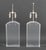 Pair of Modern Clear Acrylic and Chrome Table Lamps. 30" H x 9.5" W x 4" D. Provenance: From a 500 Park Avenue Estate.