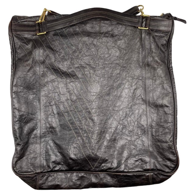 Louis Vuitton Convertible Runway Bag. Louis Vuitton messenger bag crafted in brown kangaroo skin leather. In the inside we...